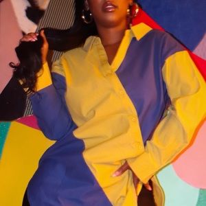 New with tags. Asymmetric tunic style top!.Cotton and polyester